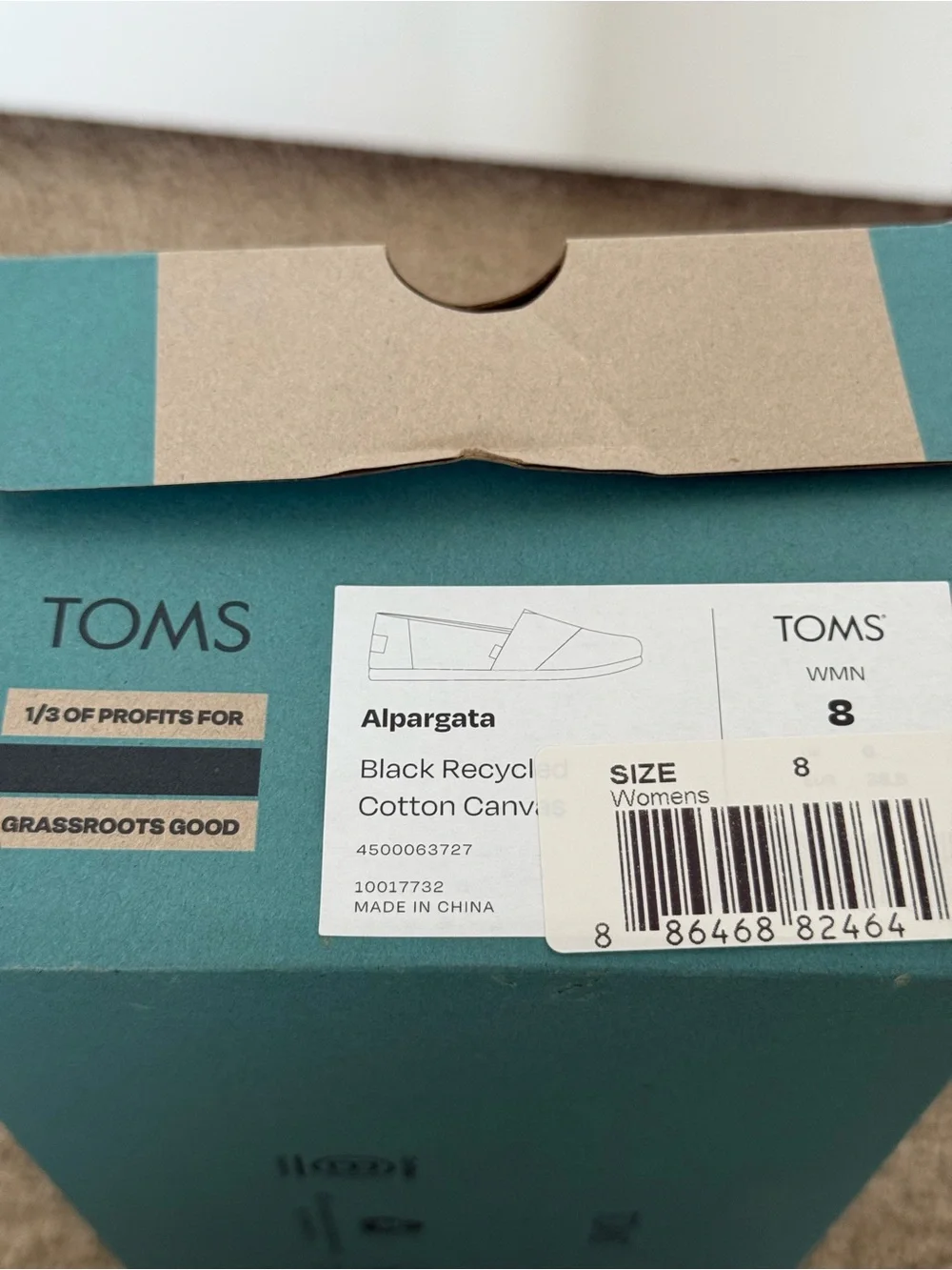 TOMS Black Canvas women’s Slip-On Loafers